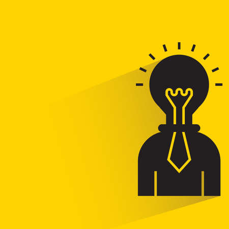 businessman and light bulb head with shadow on yellow background vectorのイラスト素材