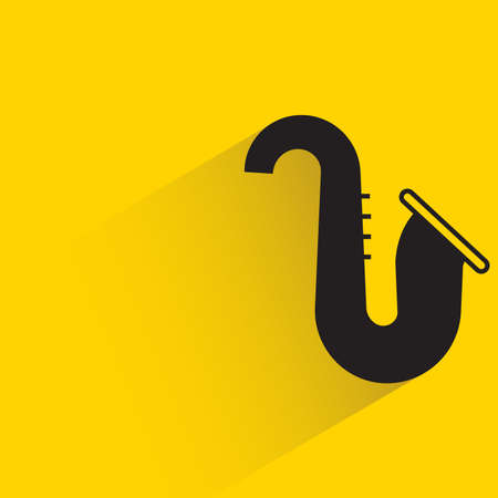 saxophone with shadow on yellow backgroundのイラスト素材