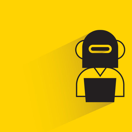 robot worker working on laptop icon on yellow backgroundのイラスト素材