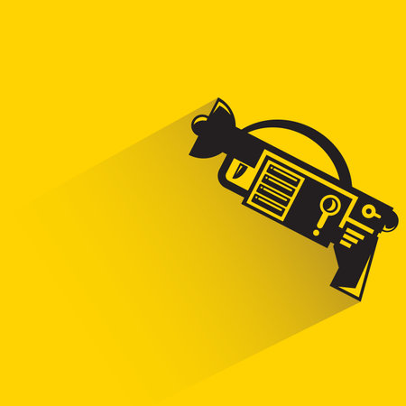 space gun with shadow on yellow backgroundのイラスト素材