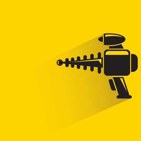 space gun with shadow on yellow backgroundのイラスト素材