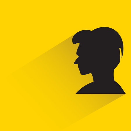 silhouette man face with drop shadow on yellow backgroundのイラスト素材