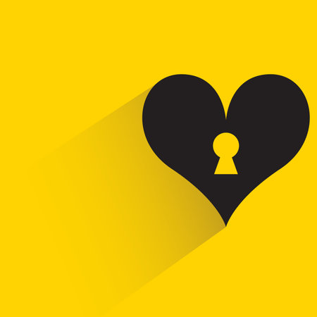 heart and keyhole icon with shadow on yellow backgroundのイラスト素材