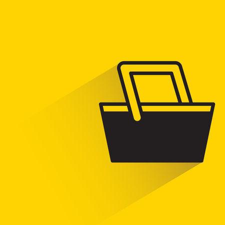 shopping basket icon with shadow on yellow backgroundのイラスト素材