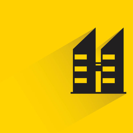 building tower with shadow on yellow backgroundのイラスト素材