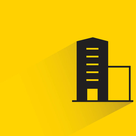building icon with shadow on yellow backgroundのイラスト素材