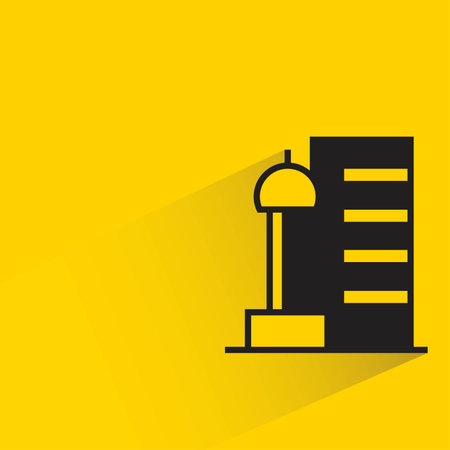 office tower building icon with shadow on yellow background, flat design, vector illustrationのイラスト素材