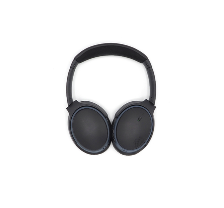 Black wireless headphone around ears and white background.の写真素材