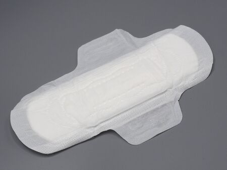 Soft and comfort sanitary napkin pad and grey background.の写真素材