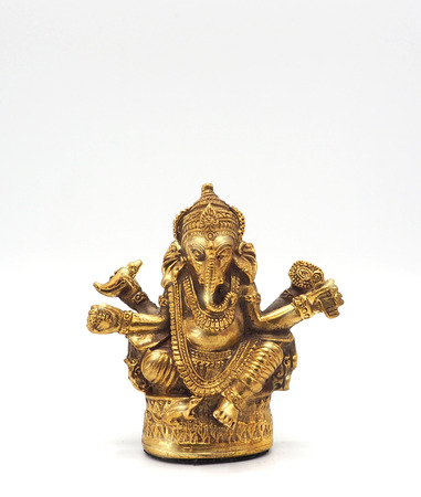 Gold metallic shining ganesha lord of success and white background.の写真素材