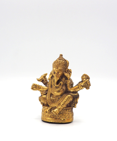 Gold metallic shining ganesha lord of success and white background.の写真素材