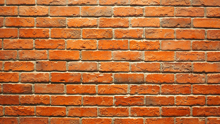 Red brick wall and old dirty rough surface texture close-up.の写真素材