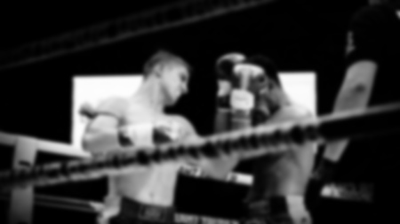 Blurred images black and white photo style of Thai boxing or Muay Thai or Kickboxing which local and...
