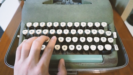 Old typewriter machine in good condition with no paper in feed for use in the past job career such...