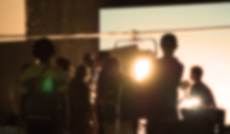 Blurry images of studio video shooting behind the scene or b-roll for online commercial and tvc which done by professional movie director film crew team and camera equipment with lighting setの写真素材