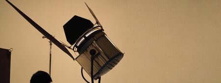 Studio light and back drop and soft box set up for shooting photo or video production which includes...