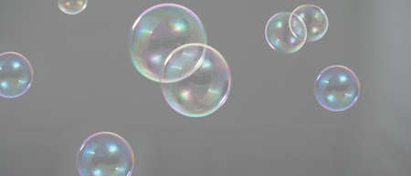 Shampoo bubbles floating like flying in the air by wind blow which represent refreshing playful...