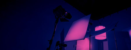 Studio light equipments for photo or film movie video. Light set for professional shooting studio background. LED Flood light and Spot light for video production studio. Setup include Barn door softbox.の写真素材