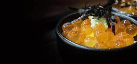 Ikura roe. Salmon Ikura Roe Served with rice and top with japanese Seaweed. Ikura don very famous...