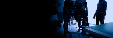 Video production behind the scenes. Making of TV commercial movie that film crew team lightman and...