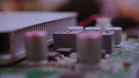 Semiconductor. cpu chip located on the green motherboard of the computer. Semi conductor motherboard...