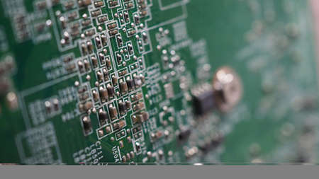 Semiconductor. cpu chip located on the green motherboard of the computer. Semi conductor motherboard...