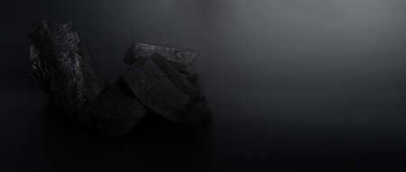 Wood charcoal. Black Charcoal on black textured floor. Used for cooking grill or other industries. Natural wood charcoal. Black carbon reesidue produced by strongly heating wood. for traditional BBQの写真素材