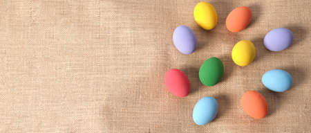Easter eggs or color egg. Multi-colorful of easter eggs on background in studio with close-up shot which include many colour such as yellow, green, blue, purple, red on festival eggs by art painting.の写真素材