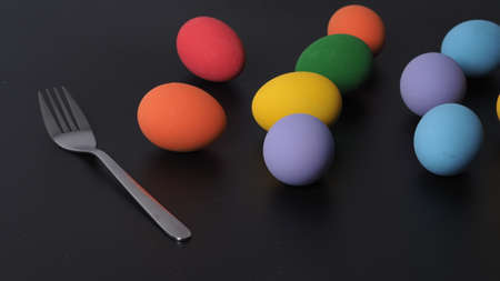 Easter eggs or color egg. Multi-colorful of easter eggs on background in studio with close-up shot which include many colour such as yellow, green, blue, purple, red on festival eggs by art painting.の写真素材