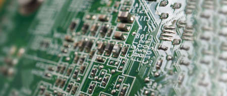 Semiconductor. cpu chip located on the green motherboard of the computer. Semi conductor motherboard...