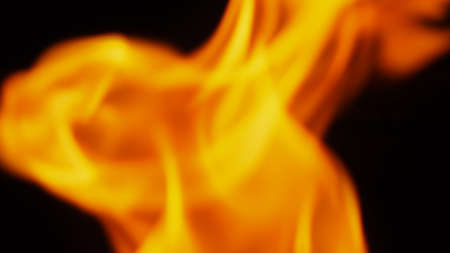 Fire background. Abstract burning flame and black background. represents the power of burning refers...