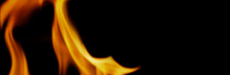 Fire background. Abstract burning flame and black background. represents the power of burning refers to heat spicy seductive sensual or burning fuels. fire incidents burning destroys everything.の写真素材