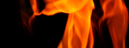 Fire background. Abstract burning flame and black background. represents the power of burning refers...