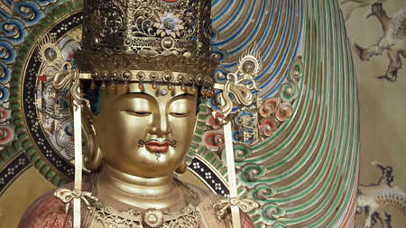 Buddha statue. Buddhist sculpture. images of chinese buddha in Singapore temple. Buddha Tooth relic temple China town which has statue of Cintamanicakra Acala Manjushri Maitreya and Samantabhadra.のeditorial素材