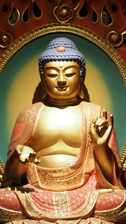Buddha statue. Buddhist sculpture. images of chinese buddha in Singapore temple. Buddha Tooth relic temple China town which has statue of Cintamanicakra Acala Manjushri Maitreya and Samantabhadra.のeditorial素材