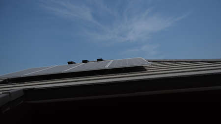 Photovoltaic. Solarcell panel. Solar roof power plant on the roof of a residential building. photo...
