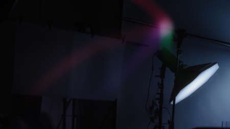 Blurry images of Studio light equipment for filming movie video or professional photo shooting. Shot...