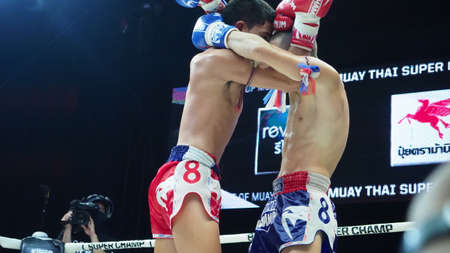 Bangkok Thailand November 11 2018. Unidentified Thai and foreign kick boxing players in competition fight Muay Thai Super Champ at Muay Thai Street Bangkok. Thai kick boxing. Illustrative Editorial.のeditorial素材