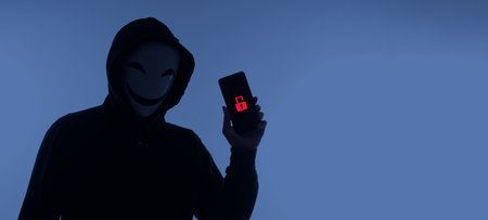 Hacker Anonymous and face mask with smartphone in hand. Man in black hood shirt holding and using...