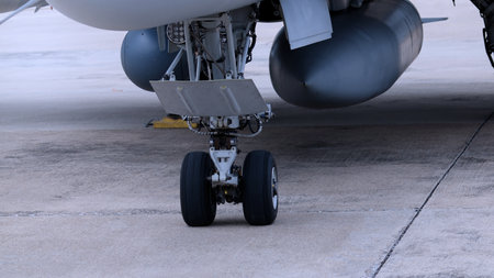 Close up of modern aircraft military fighter jet. Close up Jet parts such as landing gear engine...