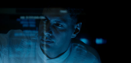Programmers and coding. Programmer or Developer working in dark room with computer code reflected on...