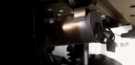 Old car suspensions. Close up car suspension wear and tear parts. CV joint Rubber boot and Control arms bushing Steering rack axles Shock absorber Brake exhaust. Gas Diesel car service repair parts.の写真素材