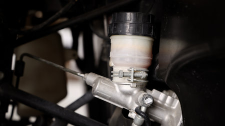 Old car suspensions. Close up car suspension wear and tear parts. CV joint Rubber boot and Control arms bushing Steering rack axles Shock absorber Brake exhaust. Gas Diesel car service repair parts.の写真素材