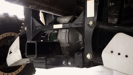 Old car suspensions. Close up car suspension wear and tear parts. CV joint Rubber boot and Control arms bushing Steering rack axles Shock absorber Brake exhaust. Gas Diesel car service repair parts.の写真素材