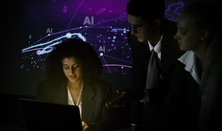 Ai and Business. Tech Startup team discussing and using artificial intelligence or digital Ai assistant.  Business innovation AI technology collaboration and ideas for future. Tech brainstorming ideaの写真素材