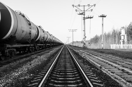 Train with oil tanks. Transportation of fuel on the railroad. Black and white shot.の写真素材