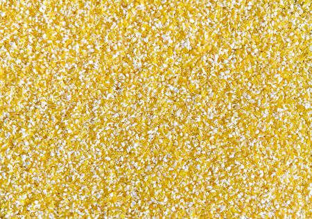Uncooked raw italian polenta backgroundの写真素材