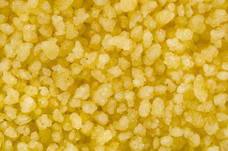 Uncooked raw couscous. Food background. Healthy lifestyle concept. Closeup macro shot.の写真素材