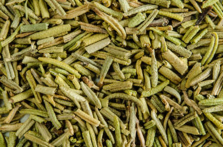 Dry leaves of rosemary. Food background. Closeup macro shot. Top view.の写真素材