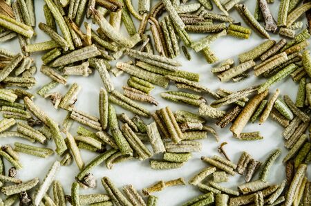Dry leaves of rosemary. Food background. Closeup macro shot. Top view.の写真素材